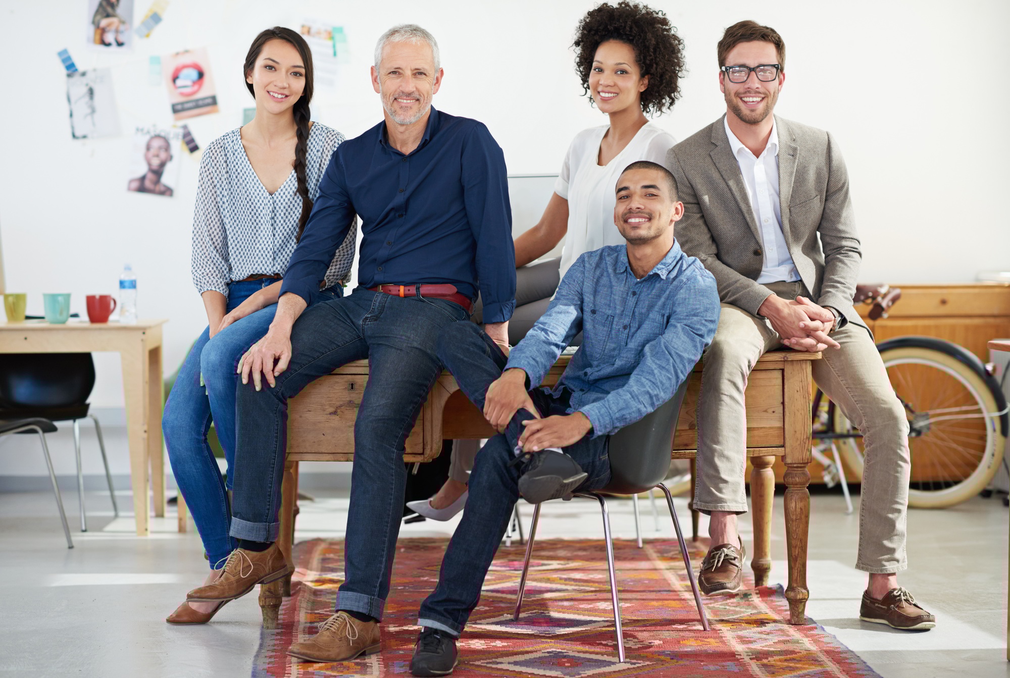 The dream design team. Portrait of a team of designers in their modern office.