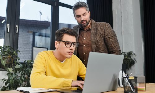 Employee onboarding experience in a modern office setting with focused mentorship
